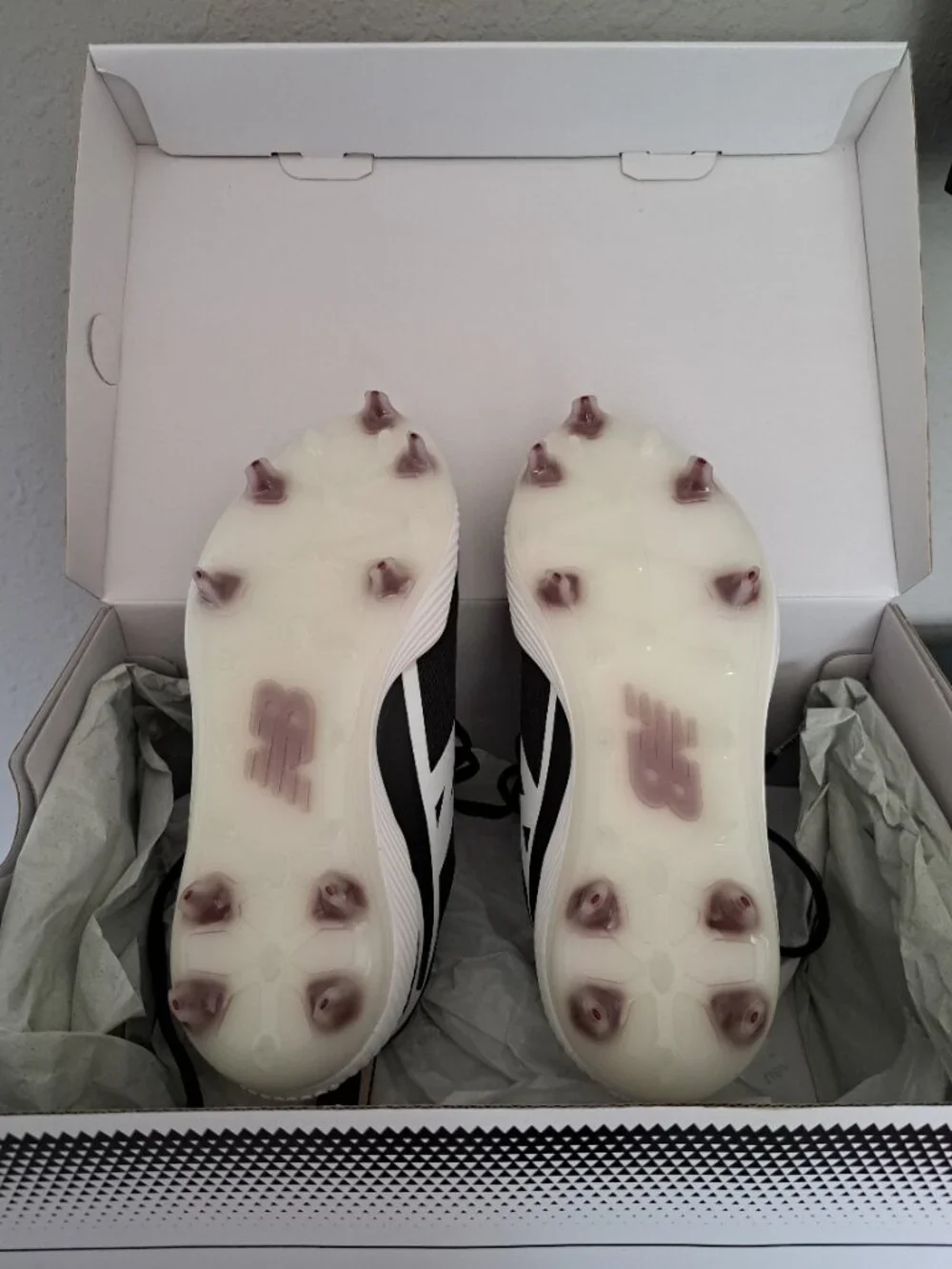 New Balance molded cleats